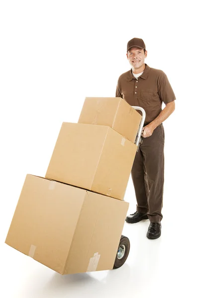 Homem em movimento entrega caixas — Fotografia de Stock