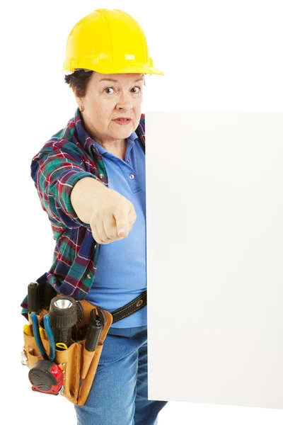 Serious Worker Points with Sign — Stock Photo, Image