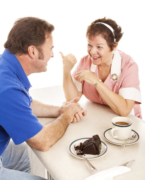 Garson kız sohbetleri ile müşteri — Stok fotoğraf