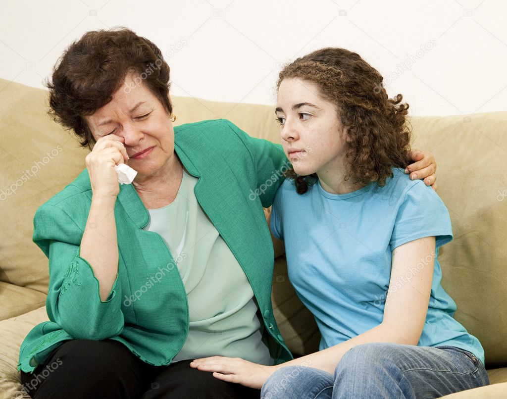 Teen Comforts Mother