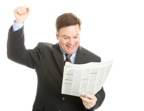 Бизнесмен читает хорошие новости — стоковое фото