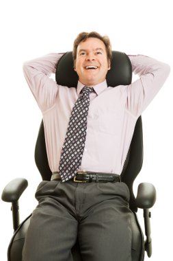 Businessman Enjoys Ergonomic Chair clipart