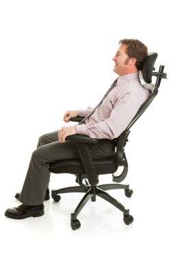 Relaxing in Ergonomic Chair clipart