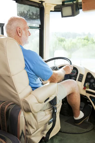 Senior Man Drives Motor Home — Stok Foto