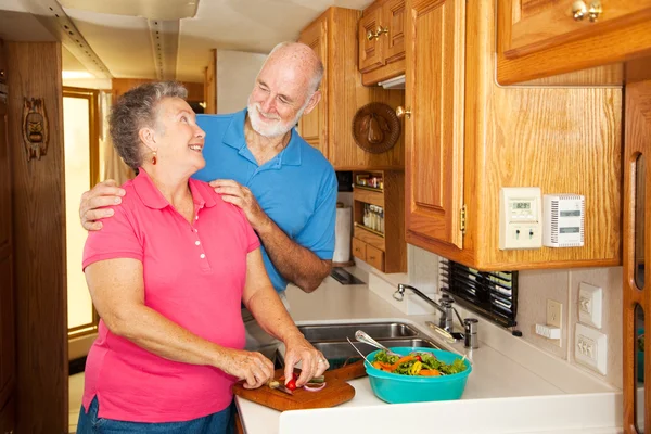 Seniors RV - Romance in Kitchen — Stock Photo, Image