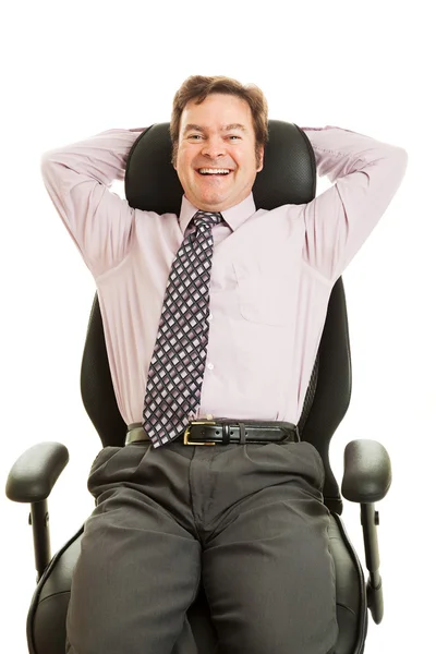 Glad verkställande i ergonomisk stol — Stockfoto