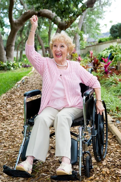 Успех пожилых людей с ограниченными возможностями — стоковое фото