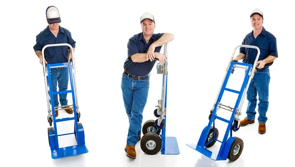 Three Delivery Guys with Dollies — Stock Photo, Image