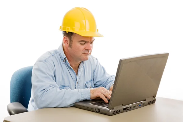 Construction Engineer on Computer Stock Picture