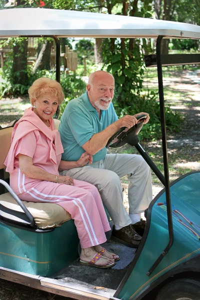 Golf cart - senioren — Stockfoto
