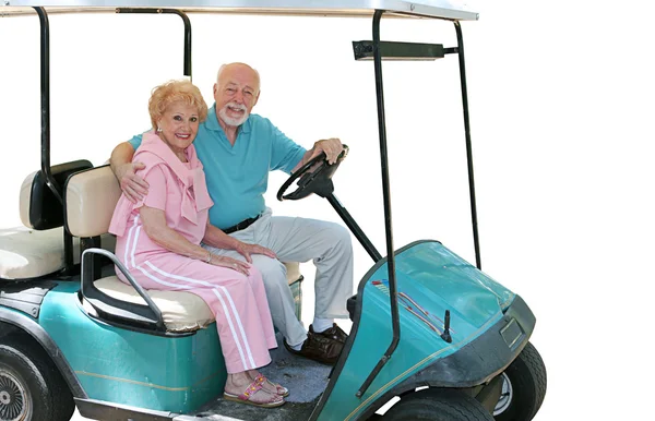 Carretto da golf anziani isolato Immagini Stock Royalty Free