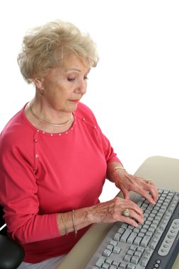 Senior Lady Learns Computer clipart