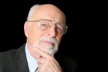 Stock Photo of a Skeptical Senior Man clipart