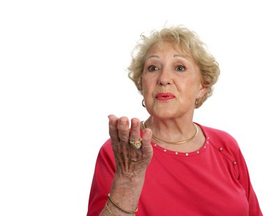 Senior Lady Blows a Kiss clipart