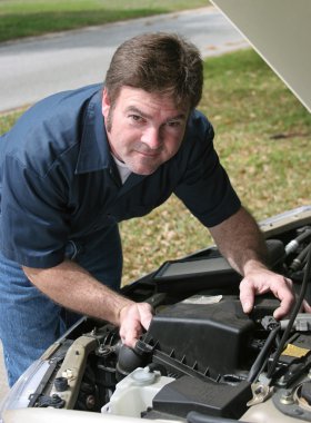 Handsome Mechanic Under Hood clipart