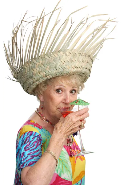 Starszy pani popija koktajl — Zdjęcie stockowe