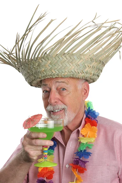 Starszy człowiek cieszy się margarita — Zdjęcie stockowe