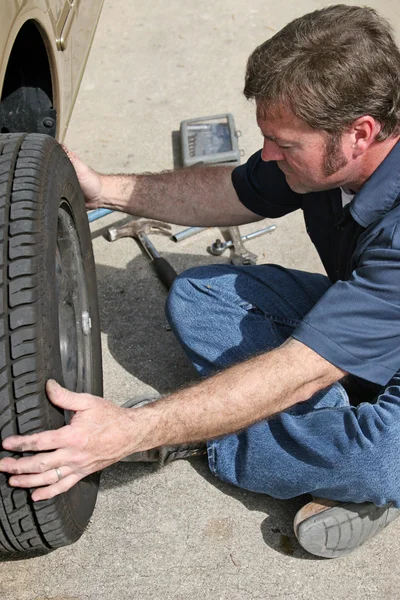 Mechanic Removing Tire — Stock Photo, Image