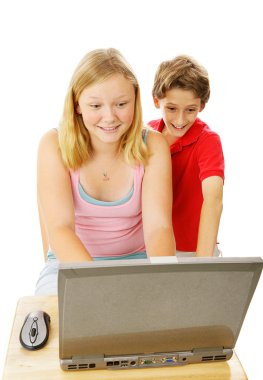 Brother and Sister on Computer clipart