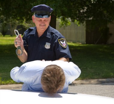 Police Officer with Handcuffs clipart