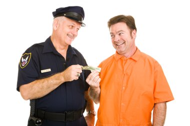 Polis memuru rüşvet kabul eder.