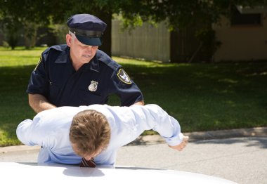 Policeman Arrests Driver clipart