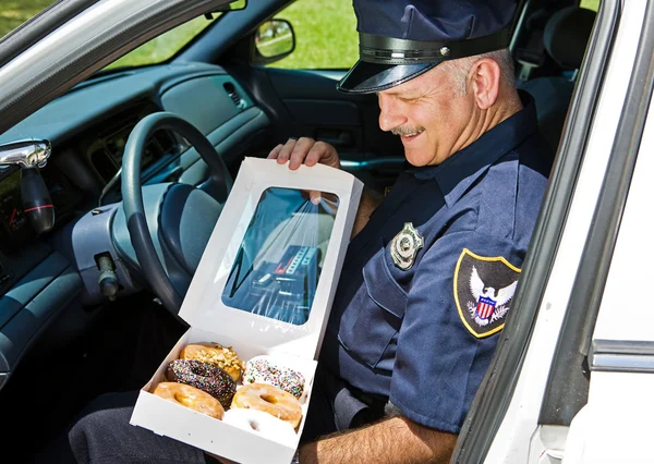 Hungriger Polizist — Stockfoto