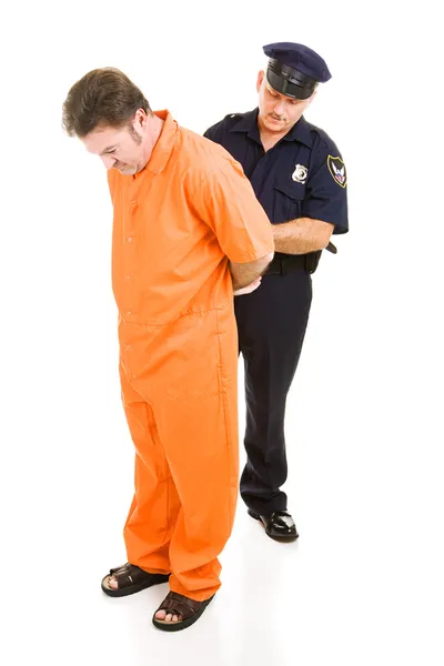 Tisztviselő bilincs fogoly — Stock Fotó