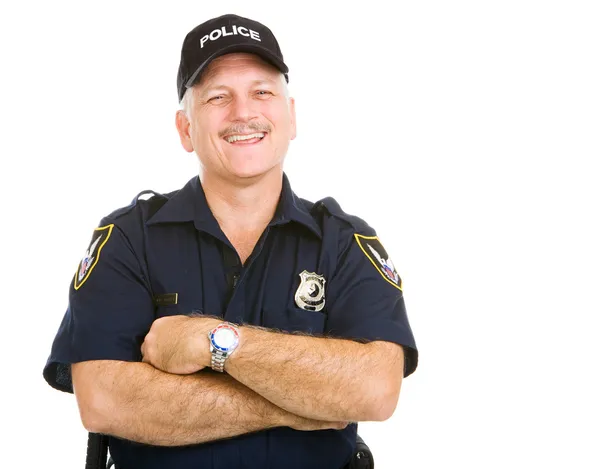 Офицер полиции смеется — стоковое фото