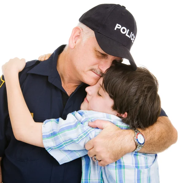 Polícia e Boy Abraço — Fotografia de Stock