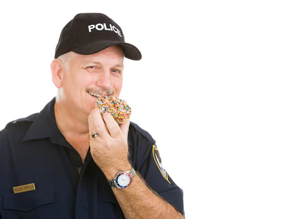 Polis med donut — Stockfoto
