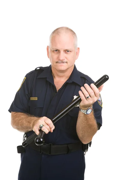 Polis med batongen — Stockfoto