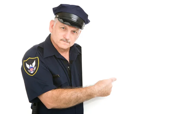 Poważne policjanta wskazującego — Zdjęcie stockowe