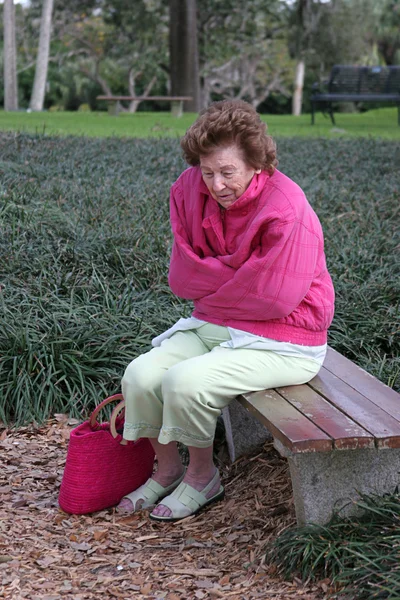 Senior Woman Cold & Sad — Stock Photo, Image