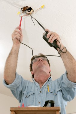 Electrician Testing Voltage clipart