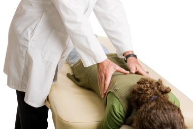 Chiropractor Doing Adjustment clipart