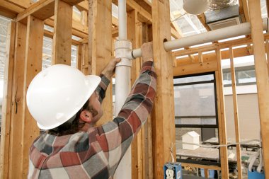 Construction Worker Connecting Pipe clipart