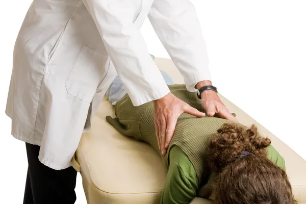 Chiropractor fazendo ajuste — Fotografia de Stock