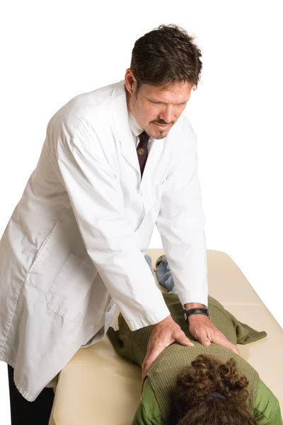 Quiroprático fazendo manipulação da coluna vertebral — Fotografia de Stock