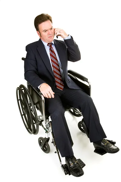 Инвалидный бизнесмен - серьезный разговор — стоковое фото