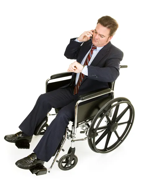 Uomo d'affari disabile in ritardo — Foto Stock