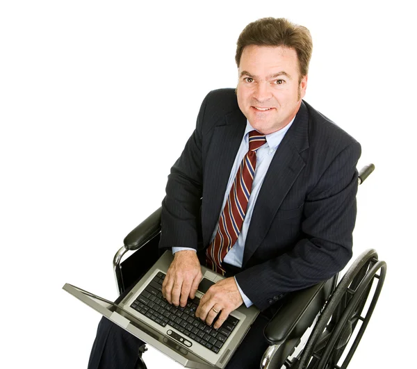 Homme d'affaires handicapé sur ordinateur — Photo