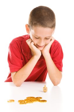 Boy Playing Dreidel clipart