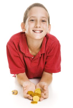 Little Boy Holding Hanukkah Gelt clipart