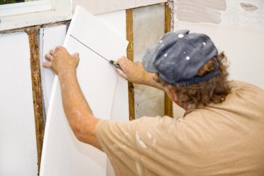 Contractor Installing Insulation clipart