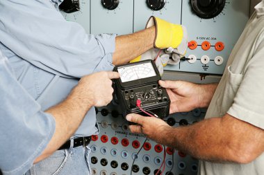 Electrical Team Testing Voltage clipart