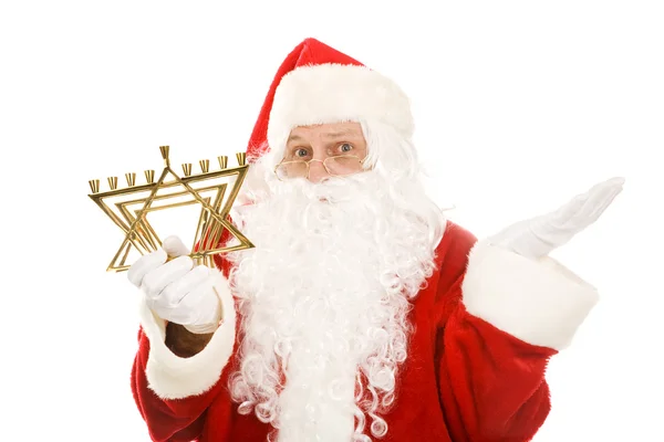 Santa förvirrad av menorah — Stockfoto