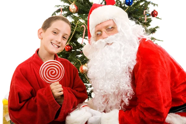 Santa i mały chłopiec — Zdjęcie stockowe