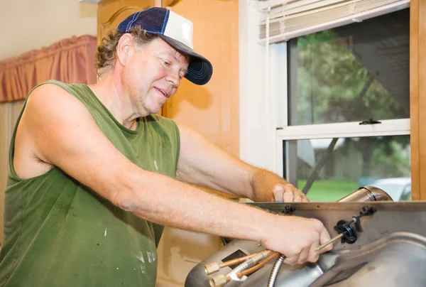 stock image Plumber Istalling Faucet