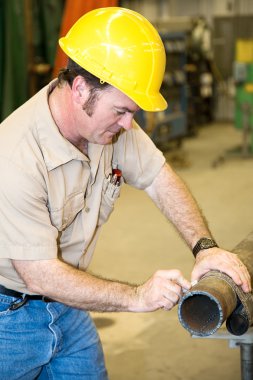 Construction Worker Marking Pipe clipart